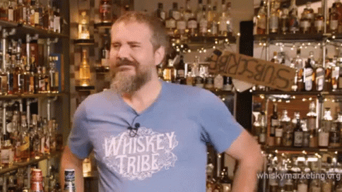 Man With Beard In Blue Whiskey Tribe Shirt GIF
