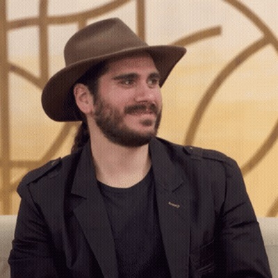 Man With Beard In Brown Hat And Black Jacket GIF