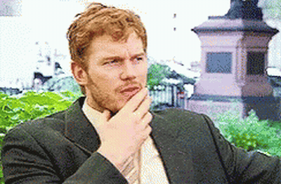 Man With Beard In Brown Vest GIF