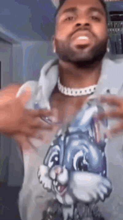 Man With Beard In Bunny T-Shirt And Necklace GIF