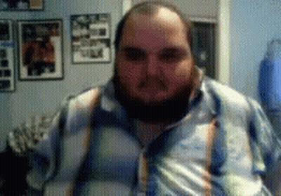 Man With Beard In Colorful Shirt And Suspenders GIF