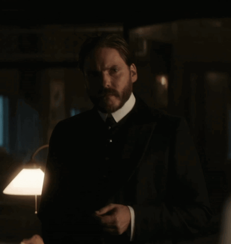 Man With Beard In Dark Room GIF