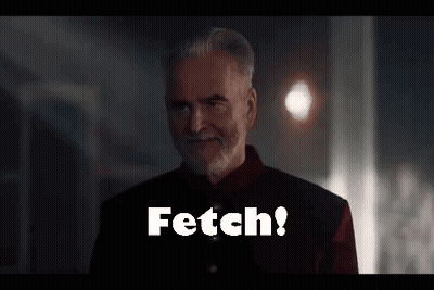 Man With Beard In Dark Room Saying Fetch GIF