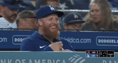 Man With Beard In Dodgers Hat Smiles GIF