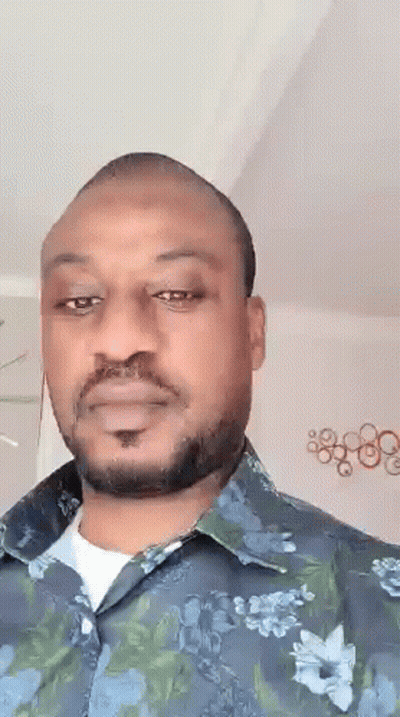 Man With Beard In Floral Shirt GIF