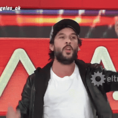 Man With Beard In Front Of Angeles Ok Sign GIF
