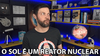 Man With Beard In Front Of Bookshelf Saying O Sole Um Reator Nuclear GIF