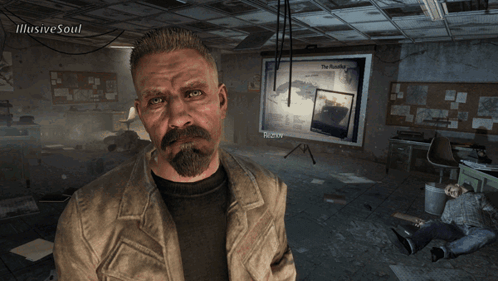 Man With Beard In Front Of Bulletin Board With Picture Of Man GIF