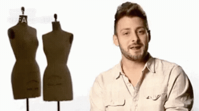 Man With Beard In Front Of Mannequin GIF