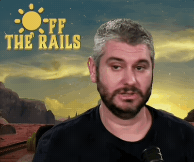 Man With Beard In Front Of Off The Rails Sign GIF