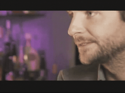 Man With Beard In Front Of Purple Background GIF