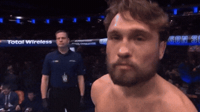 Man With Beard In Front Of Total Wireless Sign GIF