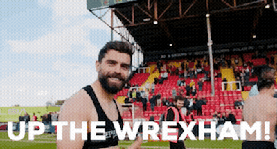 Man With Beard In Front Of Wrexham Stadium GIF