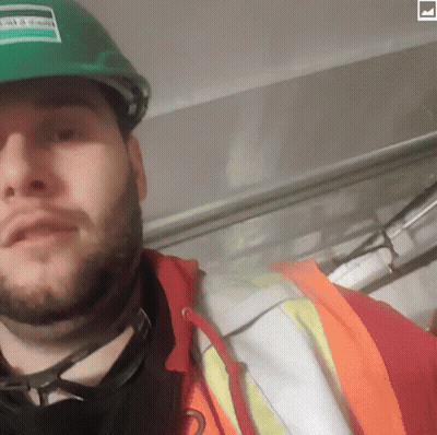 Man With Beard In Green Hard Hat And Orange Jacket GIF