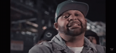Man With Beard In Green Hat And Gray Shirt GIF