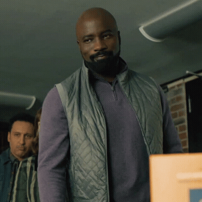 Man With Beard In Grey Vest GIF