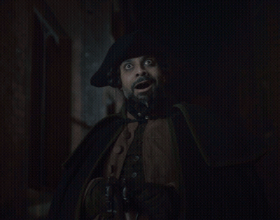 Man With Beard In Hat And Cape GIF