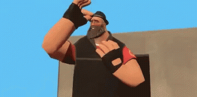 Man With Beard In Hat And Gloves Standing In Front Of Building GIF