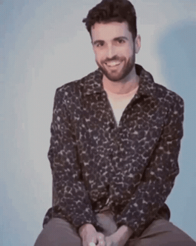 Man With Beard In Leopard Shirt Smiling GIF