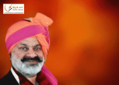 Man With Beard In Pink Turban Under Facebook Logo GIF