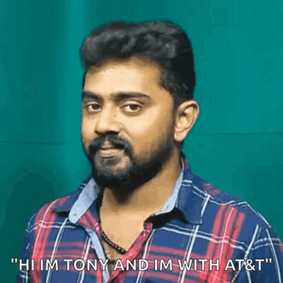 Man With Beard In Plaid Shirt Says Hi Tony GIF