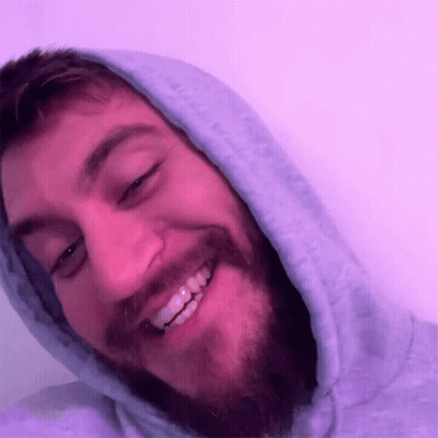 Man With Beard In Purple Hoodie Smiling GIF