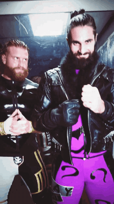 Man With Beard In Purple Pants With Question Mark GIF
