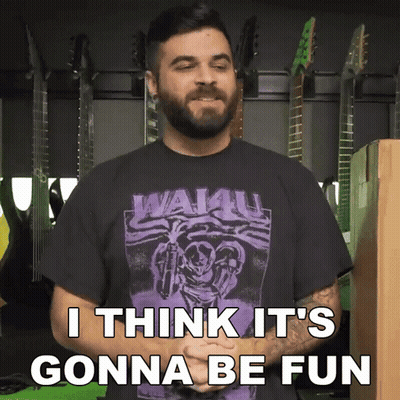 Man With Beard in Purple Shirt Saying Wai4u