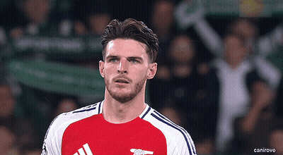 Man With Beard In Red And White Soccer Uniform GIF