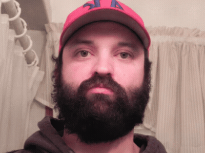 Man With Beard In Red Hat A GIF