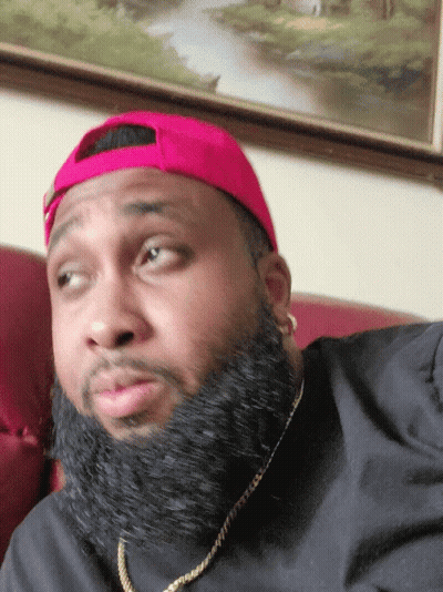 Man With Beard In Red Hat And Gold Chain GIF