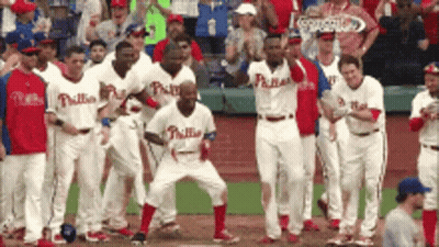 Man With Beard In Red Hat And Jersey Number 20 GIF
