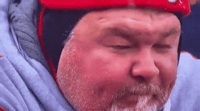 Man With Beard In Red Helmet And Blue Jacket GIF