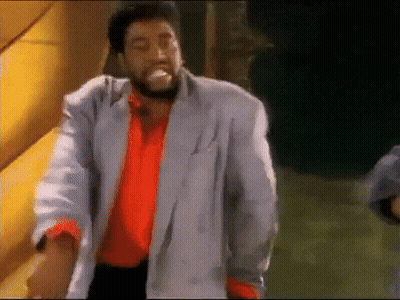 Man With Beard In Red Shirt And Grey Jacket GIF