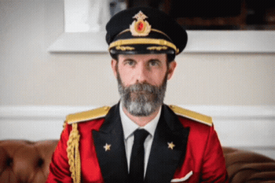 Man With Beard In Red Suit And Black Hat GIF