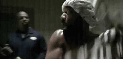 Man With Beard In Shower Cap Another Man Looks On GIF