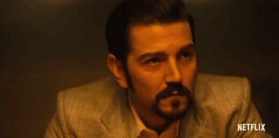 Man With Beard In Suit And Netflix Logo GIF