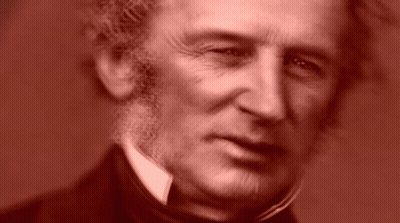 Man With Beard In Suit And Tie Looking At Camera GIF