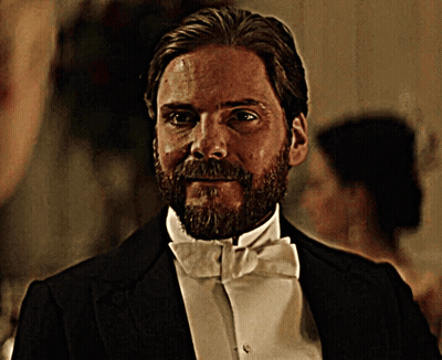Man With Beard In Suit And Tie Looking Out Window GIF