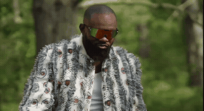 Man With Beard In Sunglasses And Fur Coat With Eyes GIF