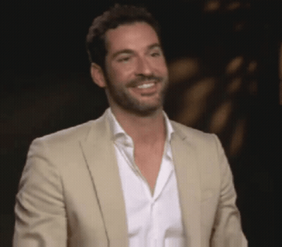 Man With Beard In Tan Suit And White Shirt GIF
