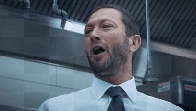 Man With Beard in White Shirt and Black Tie