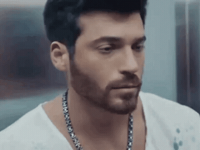 Man With Beard In White Shirt And Necklace GIF