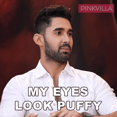 Man With Beard In White Shirt Saying My Eyes Look Puffy GIF