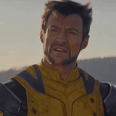 Man With Beard In Yellow And Black Suit GIF