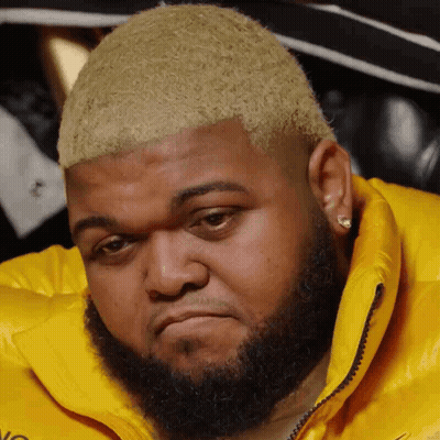 Man With Beard In Yellow Jacket GIF