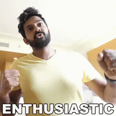 Man With Beard In Yellow Shirt Saying Enthusiastic GIF