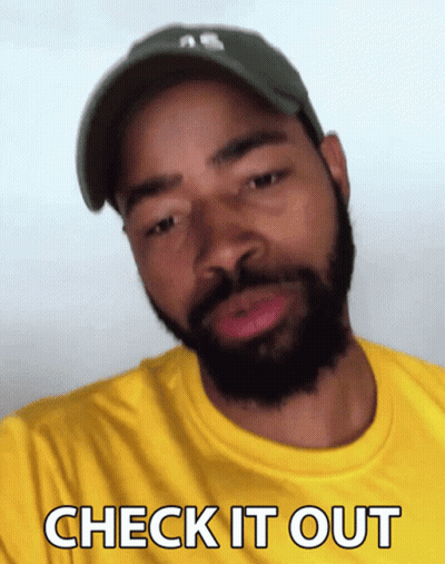 Man With Beard In Yellow Shirt Says Check It Out GIF