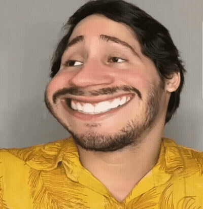 Man With Beard In Yellow Shirt Smiling GIF