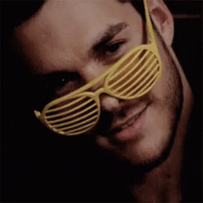 Man With Beard In Yellow Shutter Glasses GIF